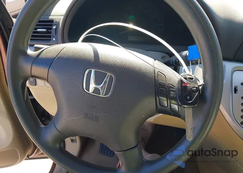 2010 Honda Odyssey Lx z USA, uszkodzony, nr VIN 5FNRL3H21AB097332